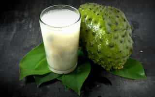 Fresh soursop fruit and juice.